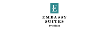 Teal rectangle with a white letter "E" and a small leaf design inside.